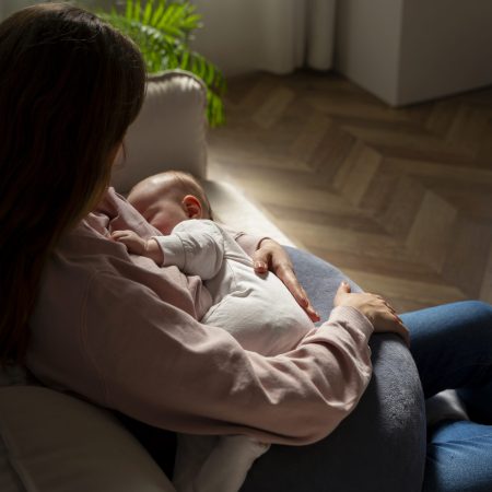 high-angle-mother-with-cute-newborn